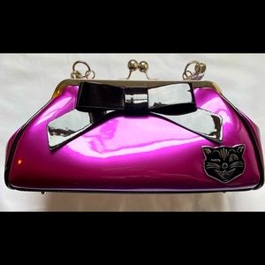 Sourpuss Purple Shimmer Vinyl Purse with Black Bow.   Very Cute!
